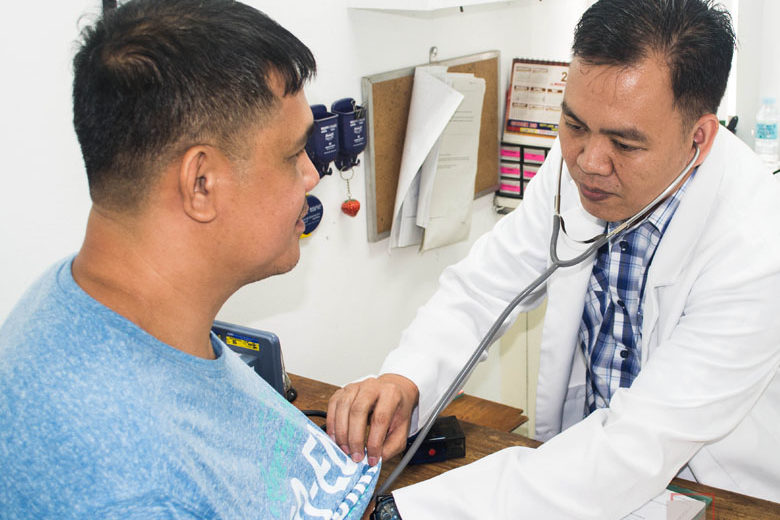 Image of American Outpatient Clinic Doctor performing Consultation Services