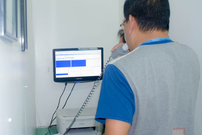 Image of an applicant performing a Spirometry Examination